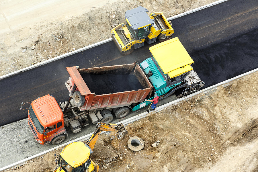 a construction trucks on the driveway